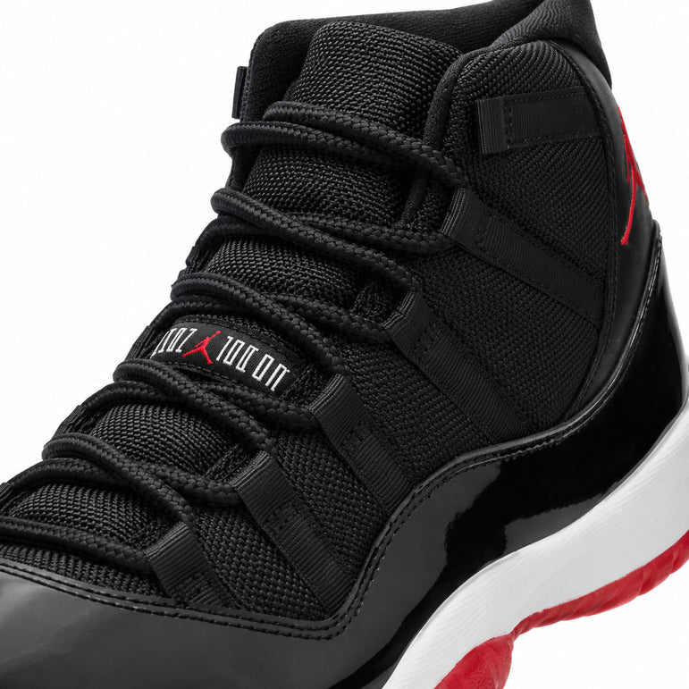 Jordan retro 11 negra con rojo