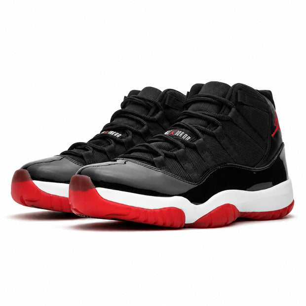 Jordan retro 11 negra con rojo